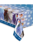A plastic table cover featuring characters from the Disney movie Frozen II, including Elsa, Anna, Kristoff, and Olaf, with a snowflake pattern and blue accents.