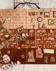 A flat lay of the Hogwarts Puffy Sticker Playset featuring cartoon characters and magical items as puffy stickers on a library background, surrounded by colorful jelly beans, a toy spider, and glasses at the top.