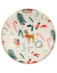 Decorative Meri Meri plate with Christmas-themed santa and reindeer illustrations on a white background