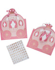 Two Pink Princess Carriage Favour Bags with ribbon handles and crown details, one personalized with Sophie. A sheet of rose gold alphabet stickers is shown beside the bags.
