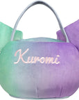 Gradient green to purple Sanrio Kuromi plush treat bucket with 'Kuromi' name embroidered, on a white background