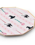 Octagonal paper plates with a gold-colored rim, featuring a whimsical Halloween pattern of black witch hats, pink broomsticks, and gold stars on a light pink striped background.