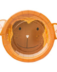 A die-cut paper plate shaped like a monkey's face with orange and brown coloring.