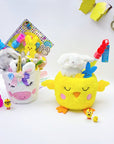 Cesta de pollitos de peluche