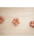 Guirlande de laine marguerite rose