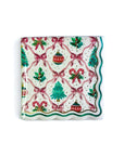 Christmas-themed paper napkin with bow ribbons, candy canes, and ornaments on a white background