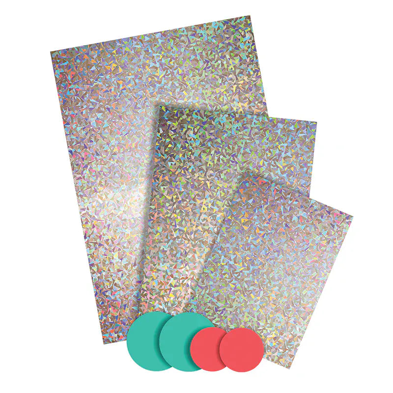 Holographic gift bags with sparkling iridescent silver pattern and three round sticker seals 