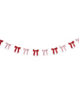 Bunting with red and pink ribbons on a white background