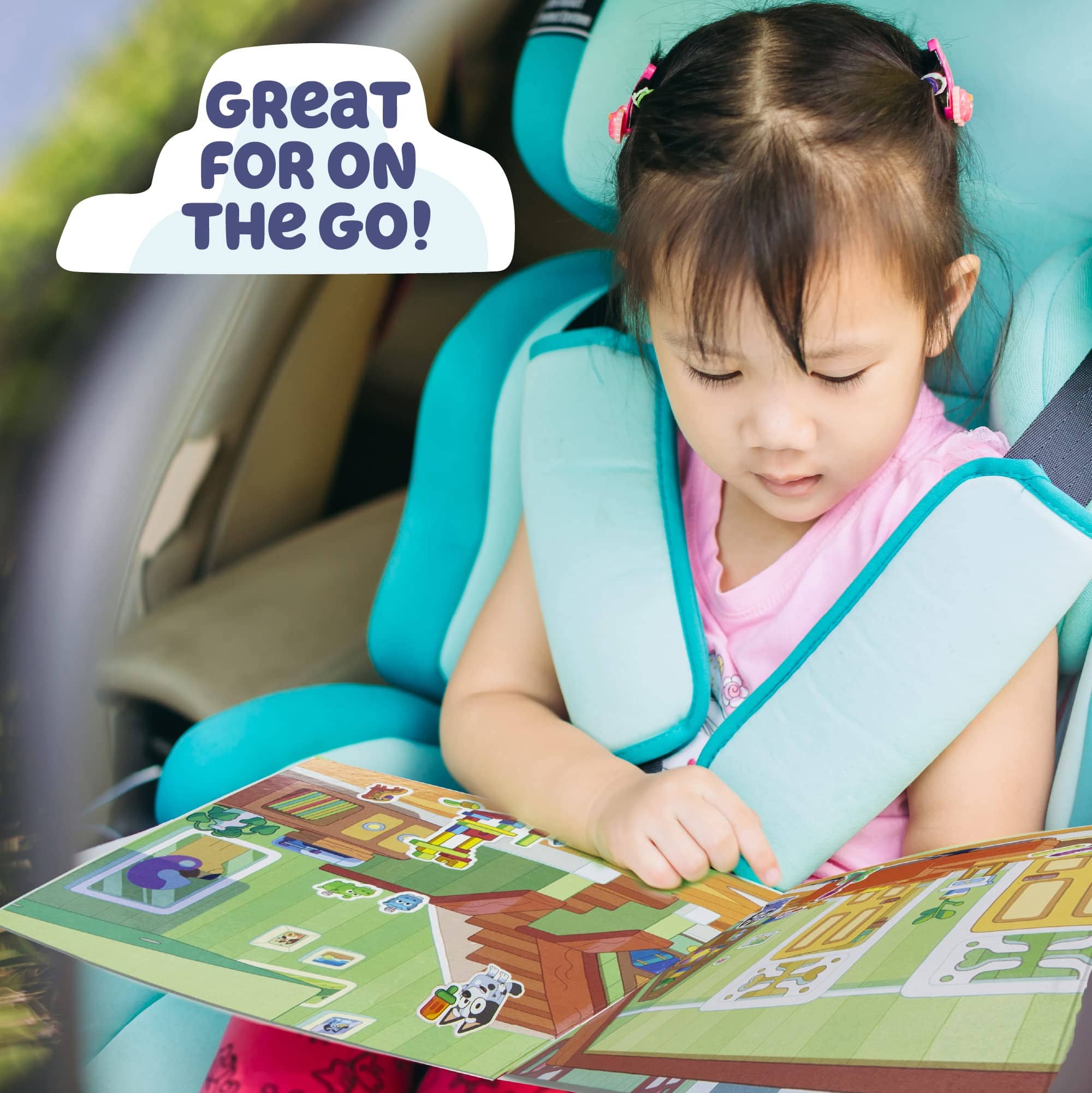 Toddler girl using Bluey Sticker Playset in car seat; great on-the-go travel activity for kids ages 3+; portable Bluey sticker book