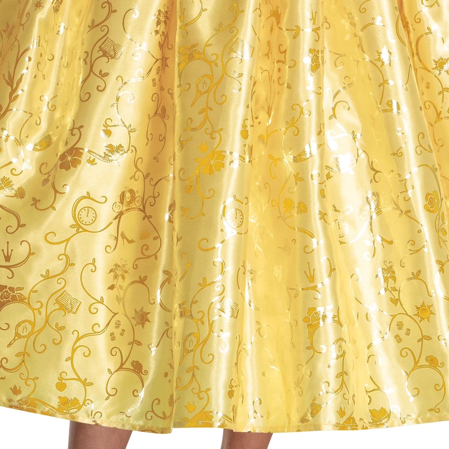 Close-up of Disney Belle costume dress gold foil satin skirt with Beauty and the Beast and Disney Princess icons: roses, enchanted clock, candlestick, and crown