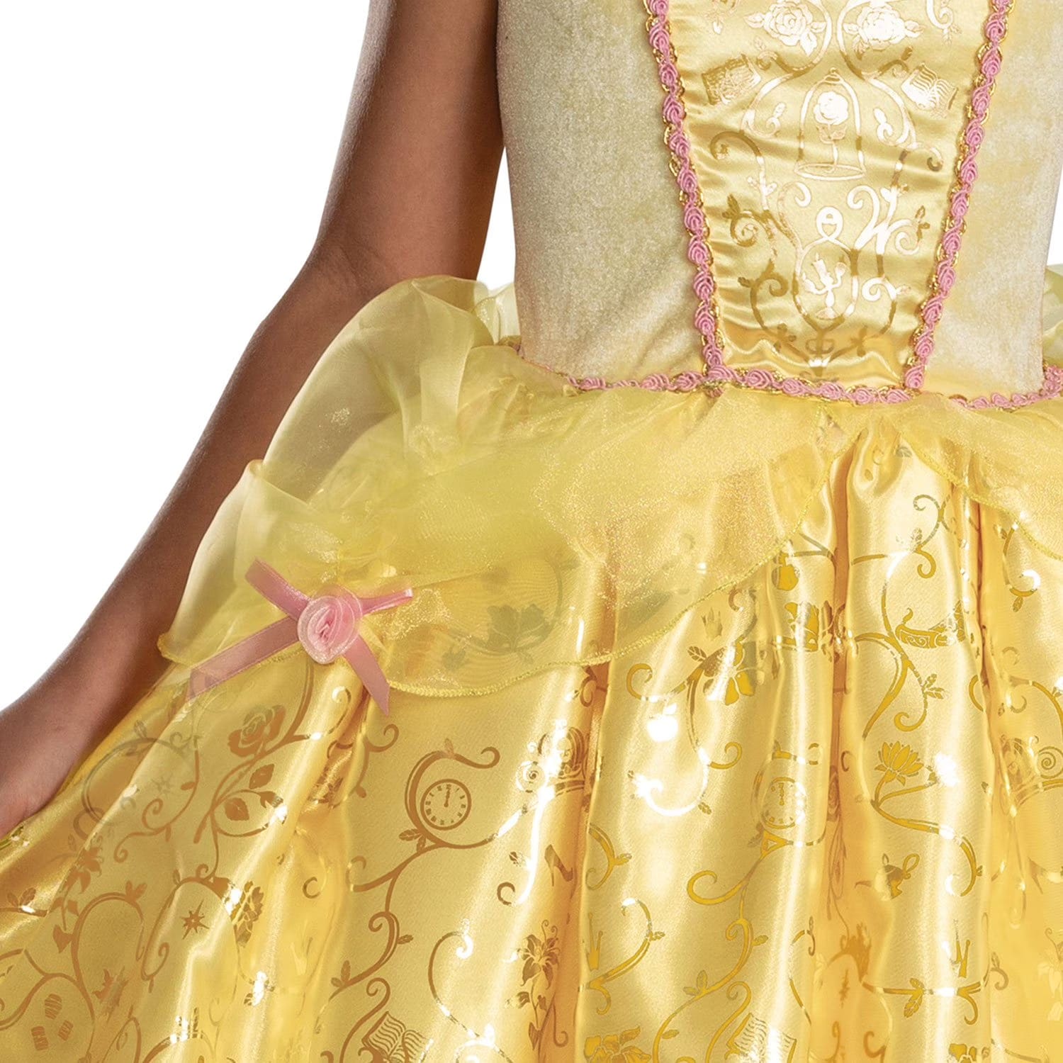 Close-up of Disney Belle costume dress yellow tulle overskirt with pink rose bow and gold Beauty and the Beast foil print ball gown skirt