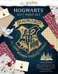 Official Wizarding World Harry Potter Hogwarts Gift Wrap Set box showing complete contents including 5 wrapping sheets, tissue paper, wax seal stickers, string, gift tags and washi tape for magical Harry Potter Themed birthday parties and celebrations