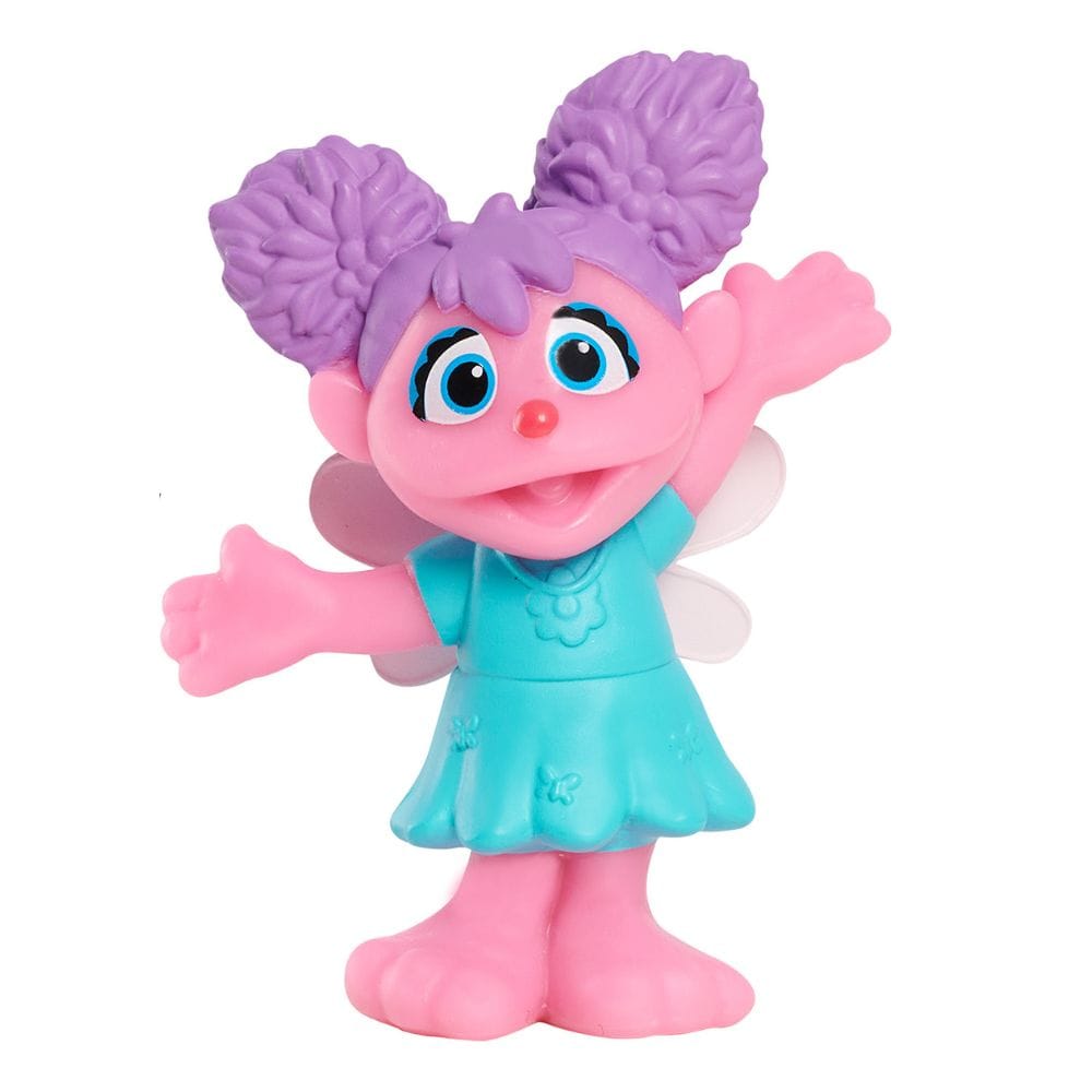 Sesame Street Abby Cadabby mini figurine for a cake topper or party favour, pink body and teal dress with purple pom-pom pigtails and blue eyes