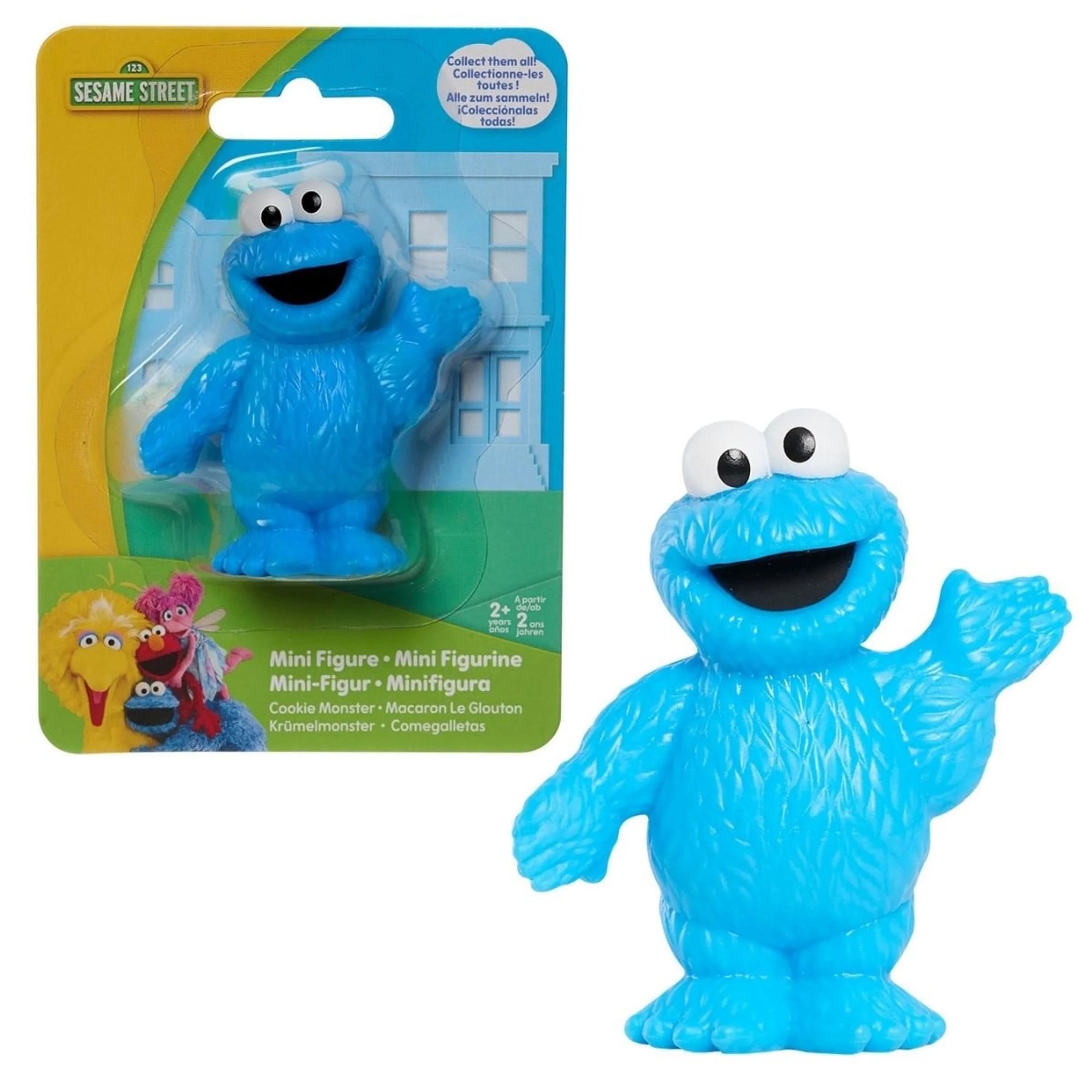 Sesame Street Cookie Monster mini figurine, 2.5 inch vivid blue monster with wide white eyes and both arms spread open