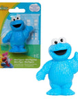 Sesame Street Cookie Monster mini figurine, 2.5 inch vivid blue monster with wide white eyes and both arms spread open