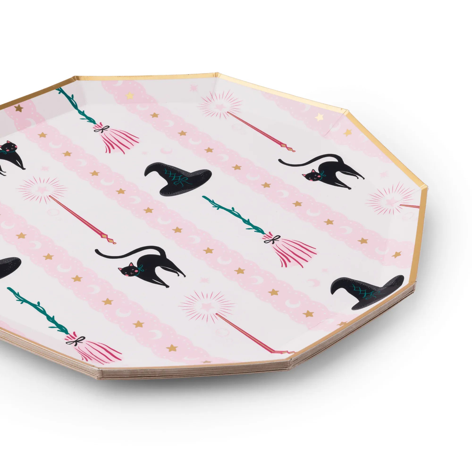 Octagonal paper plates with a gold-colored rim, featuring a whimsical Halloween pattern of black witch hats, pink broomsticks, and gold stars on a light pink striped background.