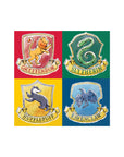 Official Harry Potter Hogwarts house crest napkins set featuring Gryffindor lion, Slytherin serpent, Hufflepuff badger and Ravenclaw eagle designs on coloured backgrounds for Harry Potter themed party supplies