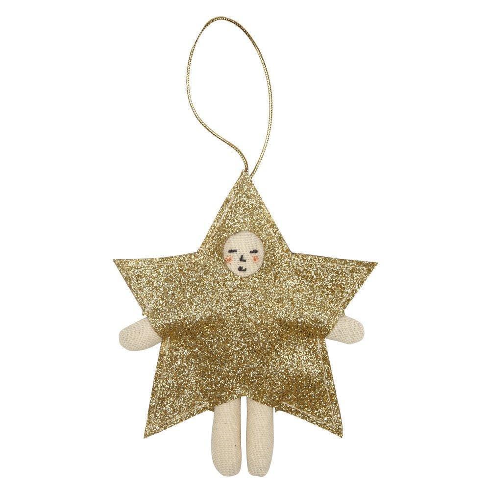 A Meri Meri gold glittering star-shaped ornament with a cotton body and a silver cord, featuring a stitched face.