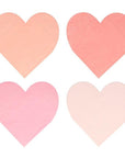 A set of 20 Meri Meri pink heart-shaped paper napkins in 4 varying shades of pink, from light to dark, with a die cut design